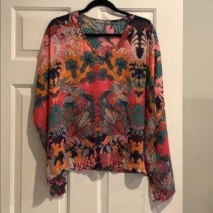 Fun print, flowy, semi sheer top.